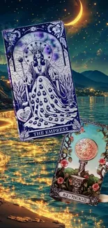 Tarot cards with mystical beach scene and moonlit sky.