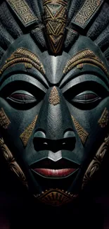 Intricate tribal mask wallpaper with rich details and dark background.