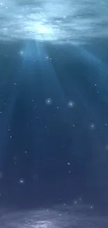 Mystical underwater wallpaper with blue hues and glowing ambient lights.
