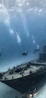 Dramatic underwater shipwreck with divers in a serene blue ocean landscape.