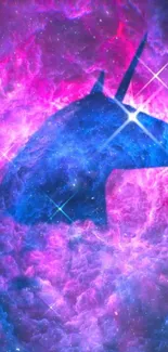 Mystical unicorn silhouette in colorful galaxy nebula wallpaper.