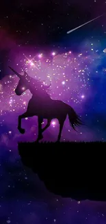 Unicorn silhouette against a vibrant galaxy sky background wallpaper.