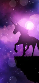 A silhouette of a unicorn against a vibrant purple and blue galaxy background.