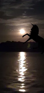 Silhouette of unicorn in moonlit night over water.