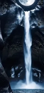 Moonlit waterfall cascading through dark cliffs creating a serene nighttime scene.
