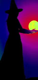 Silhouette of a witch with a glowing orb on a colorful gradient background.