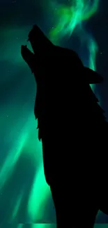 Silhouette of a wolf with Northern Lights in the background.