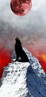 Silhouette of a wolf on snowy peak with fiery sky and red moon.