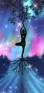 Yoga tree silhouette against a colorful aurora sky on mobile wallpaper.