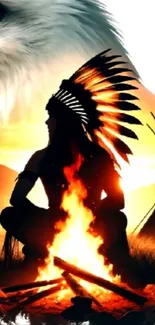 Native American warrior by fire at sunset with an eagle spirit overhead.