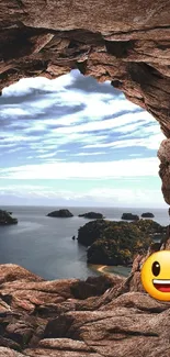 Natural cave view with ocean and sky.