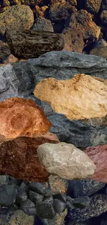 Natural stone texture featuring diverse colored rocks in a mobile wallpaper.