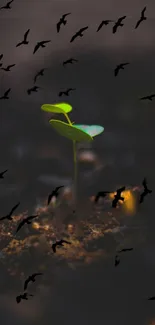 Mobile wallpaper of a green sprout amidst flying birds and a dark background.