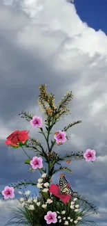 Scenic floral sky wallpaper with colorful flowers and butterflies.