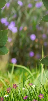 Mobile wallpaper with green leaves and colorful blooming flowers.