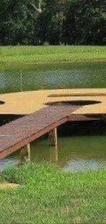 Serene wooden bridge over calm lake with lush greenery.