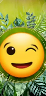 Winking emoji surrounded by green leaves with sunlight in background.