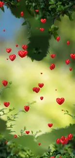 Mobile wallpaper with red hearts and green foliage.