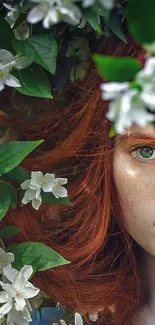 Enchanting red-haired girl amidst lush greenery and white flowers.