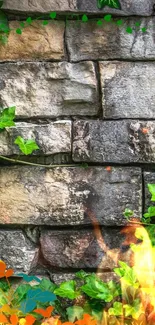 Stone wall with green leaves and fiery accents mobile wallpaper.