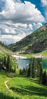 Scenic view of green mountains and a serene lake under blue skies.