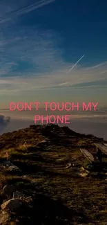 Mountain landscape with 'Don't Touch My Phone' text.