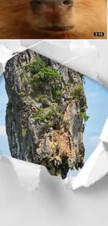 A towering rock formation seen through torn paper against a clear blue sky.