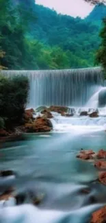 A stunning waterfall flowing through a lush green forest with rocky stream.