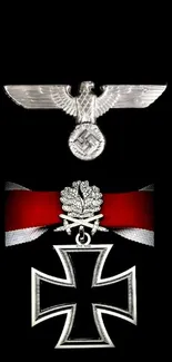 Nazi medal with eagle emblem on black background.