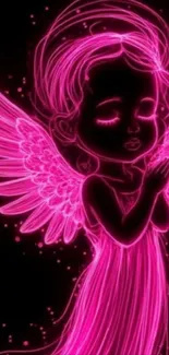 Neon angel artwork with vibrant pink wings in the dark.