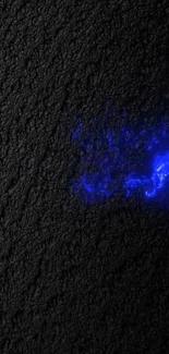 Neon blue light on dark textured background.