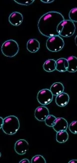 Vibrant neon bubbles on a black background wallpaper.