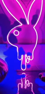 Neon bunny design with vibrant pink and purple glow on a modern wallpaper.