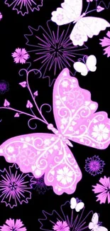 Colorful neon butterfly wallpaper with black background.