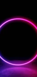 Neon circle glowing on dark background.