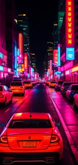 Neon-lit city street with a car driving at night, showcasing vibrant urban energy.