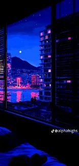 Neon city skyline framed perfectly by a window at night.