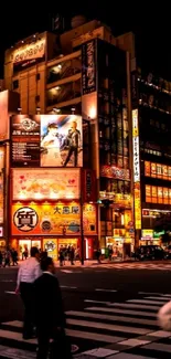 Tokyo cityscape at night with vibrant neon lights and urban street crossing.