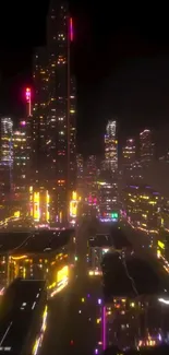 Neon-lit cityscape at night with tall buildings and bright lights.