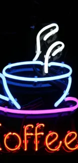 Neon coffee cup art with vibrant colors on a dark background.