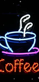 Vibrant neon coffee sign with colorful illumination on a dark background.