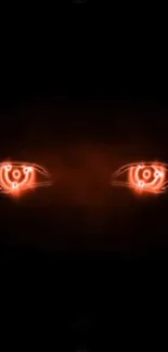 Red glowing neon eyes on a dark black background.