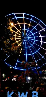 Neon-lit Ferris wheel in the dark.