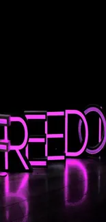 Neon pink 'FREEDOM' text on black background.