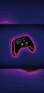 Neon game controller on a dark blue brick wall.