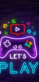 Neon gaming controller with colorful effects on a dark background.