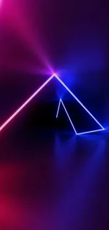 Neon triangle with glowing lines on dark background