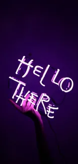 Neon 'Hello There' sign with purple glow on a dark background.