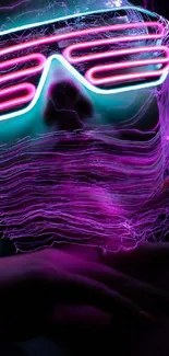 Vibrant neon glowing face artwork wallpaper with pink and teal hues.