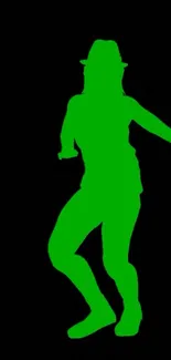 Neon green dancer silhouette on black background.